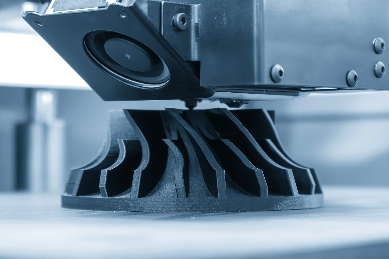 Close-up of a functional part 3D-printed in 3DXTech CarbonX Nylon6+CF showing surface quality