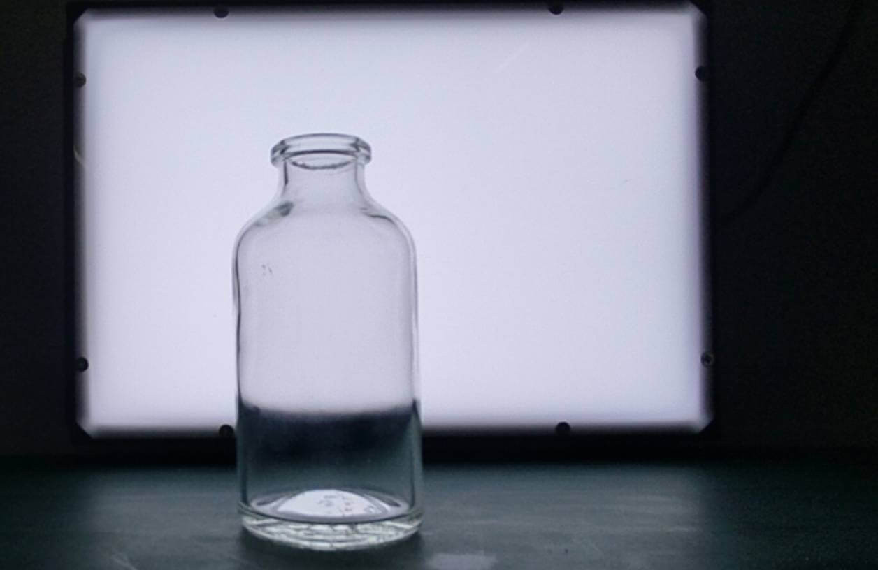 Glass bottle bore and fill level AI inspection — food beverage FMCG